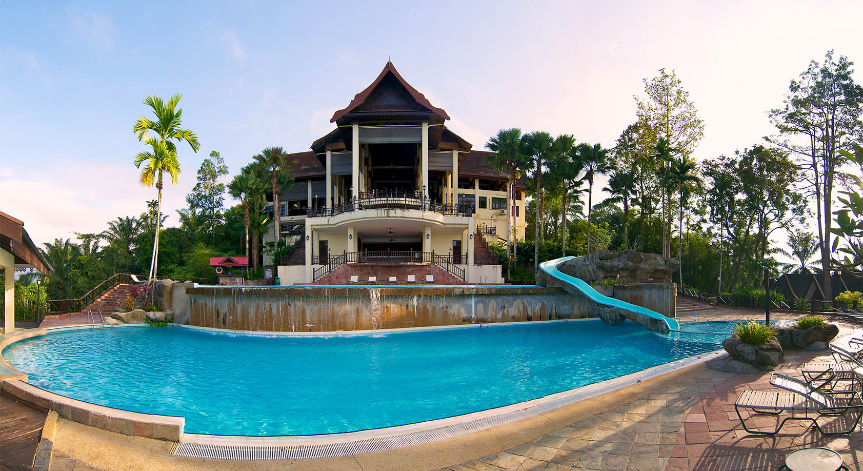 Swimming-pool-overlooking-hotel-building-1683x918
